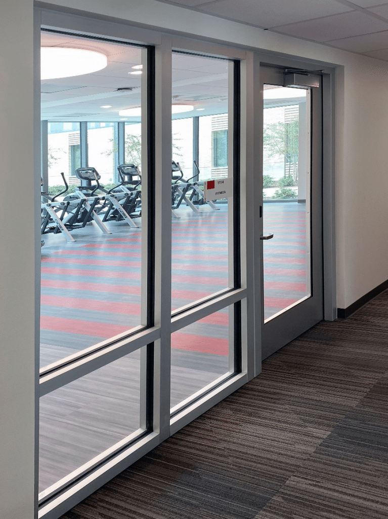 45 minute fire rated door placed in fitness room to maximize visual connectivity